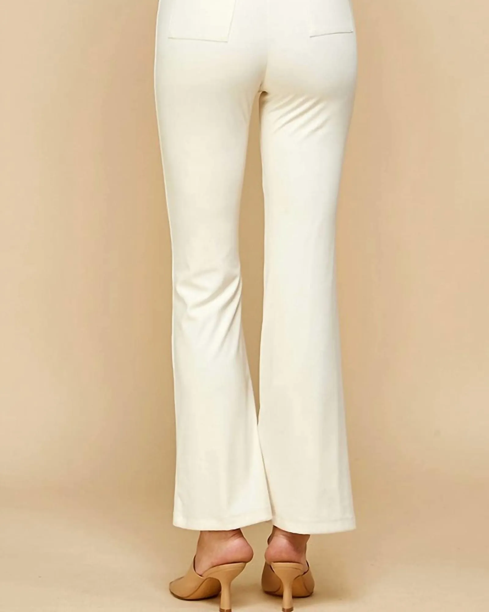 Split The Difference Front Slit Flared Pants In White | White