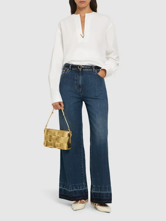 Valentino   Denim flared high rise cropped jeans 