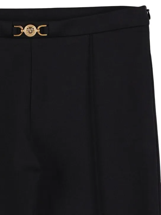 Versace   Jersey pants w/ logo buckle 