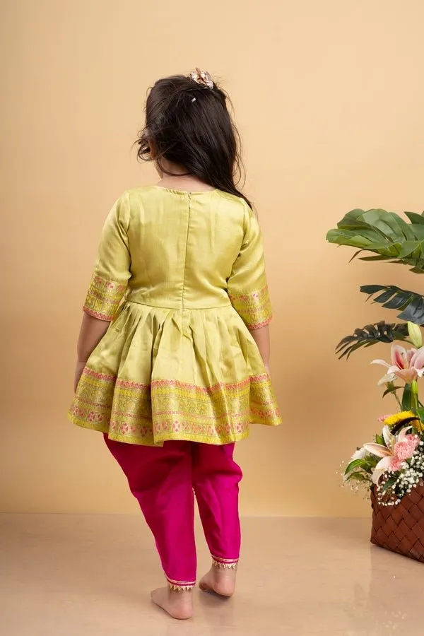 Vibrant lime Green printed kurta paired with bold fuchsia dhoti pants for a festive and playful look